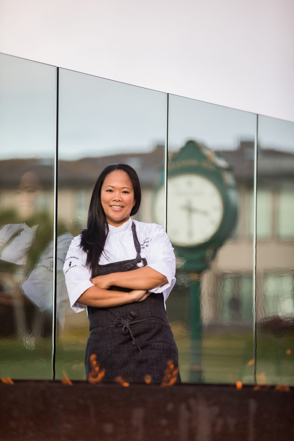 Chef Anna Marie Bayonito poses on the patio of STICKS restaurant at The Inn at Spanish Bay.