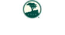 Pebble Beach Resorts heritage logo color white text