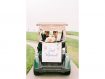 Bride and groom in golf cart with just married sign