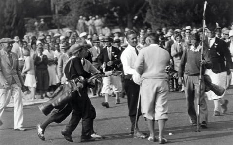 Bobby Jones shaking hands on the golf course