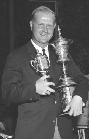 Jack Nicklaus holding trophies