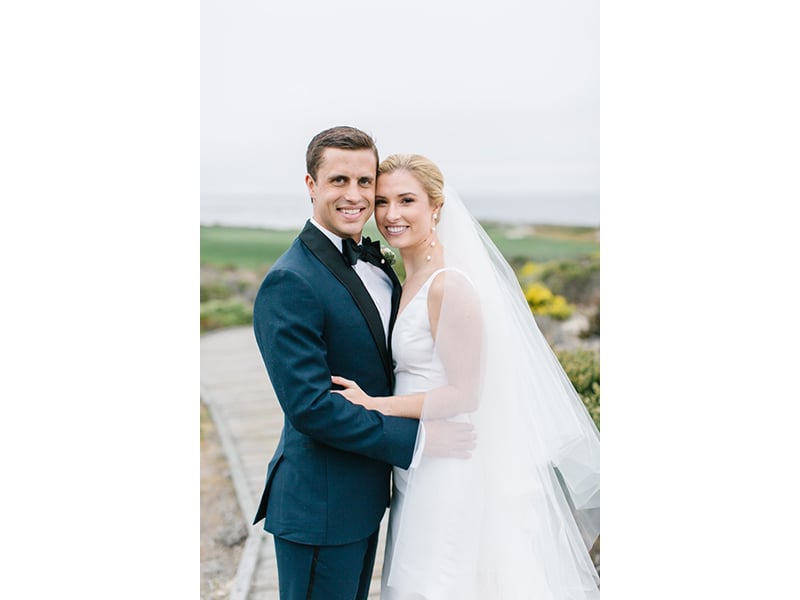 Bride and groom smiling