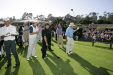 Arnold Palmer walking with gallery at Pebble Beach Golf Links