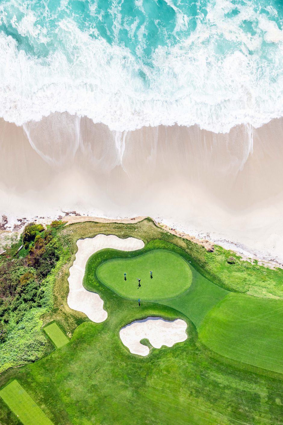 The 10th green at Pebble Beach meets Carmel Beach.