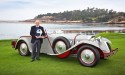 Antique silver car and man with trophy